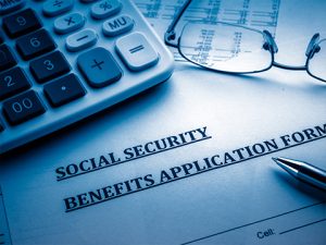early Social Security collection with investing benefits versus delaying for higher monthly payments