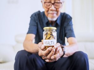 Senior reviewing their Medigap policy amid rise in Medigap premiums